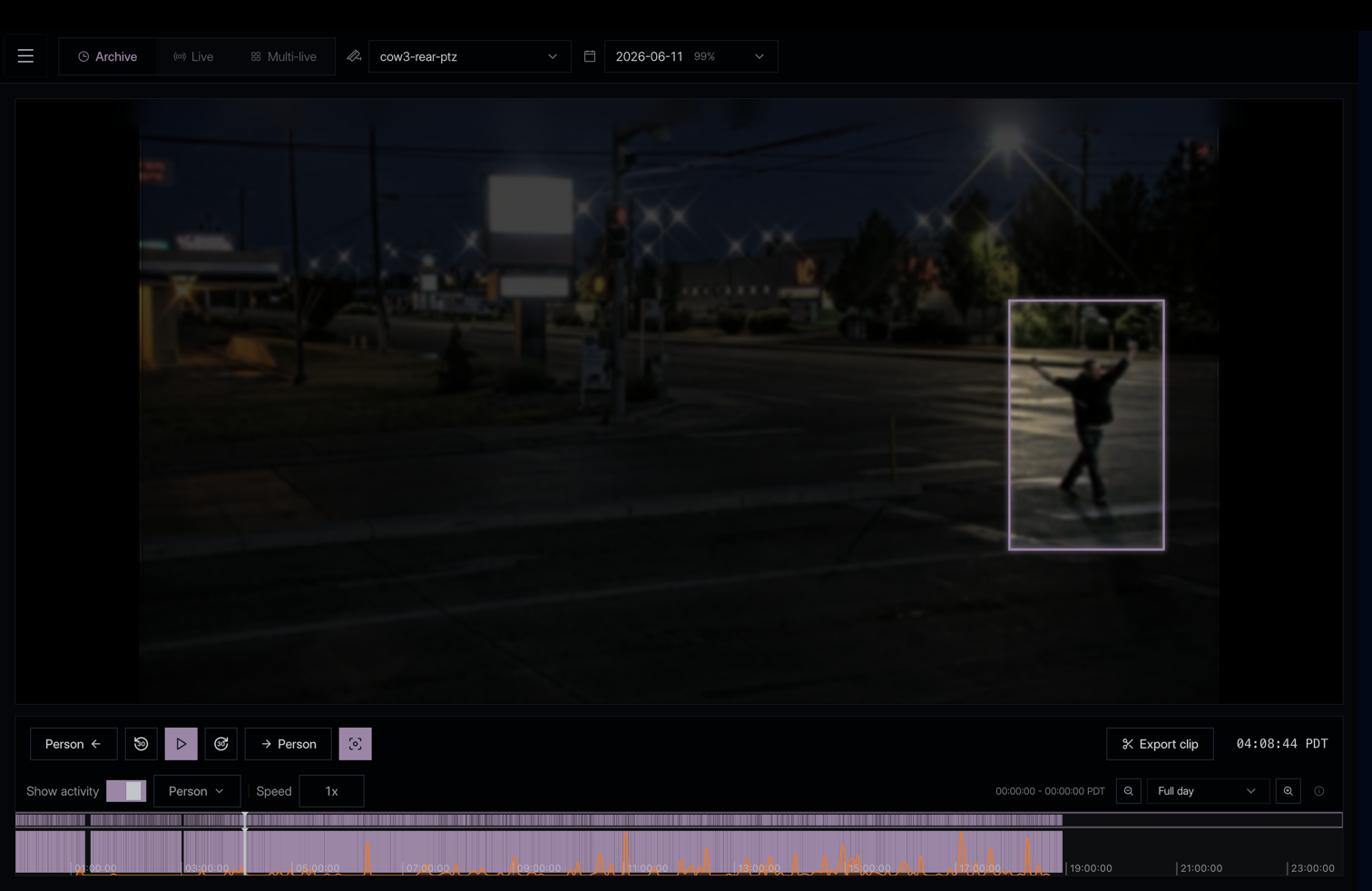 Archive player scrubbing overnight footage with a person detection boxed on the timeline